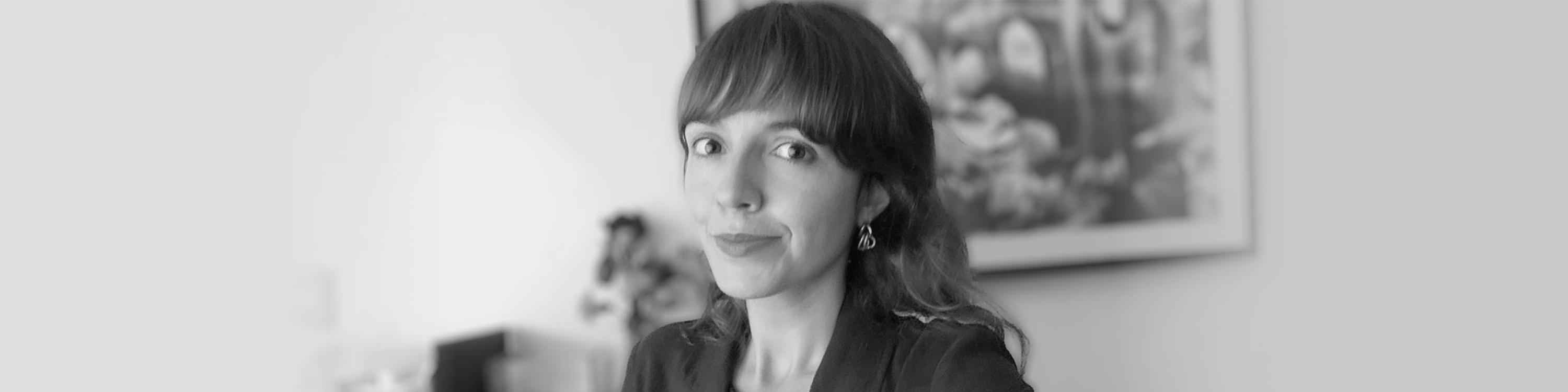 A black and white photo of Defined.ai's Director of Legal Melissa Carvalho.
